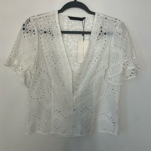 White eyelet button up blouse
